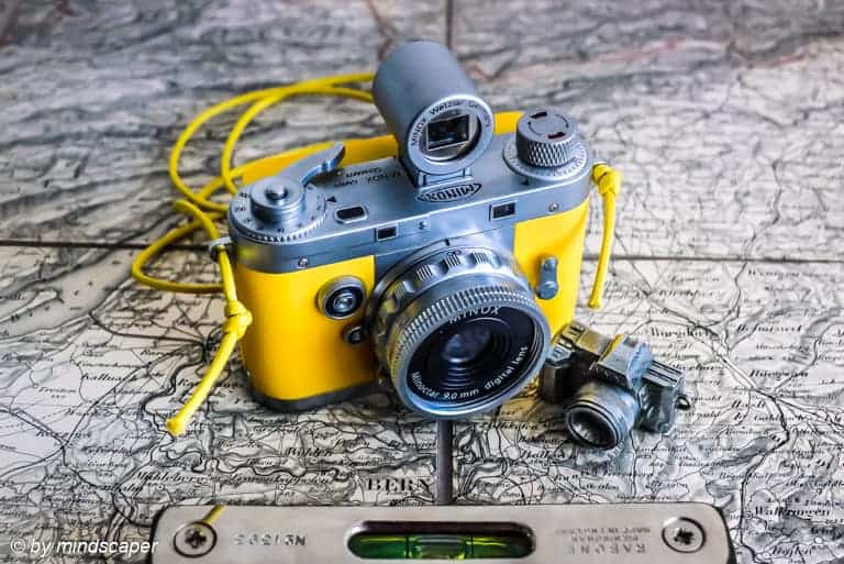 Geotagging: Yellow Vintage Camera With Spirit Level On Old Berne Map